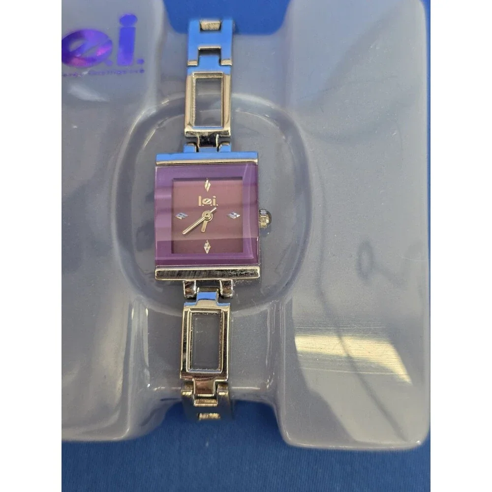 Lei Ladies Silver Toned Purple Dial Quartz Watch NIB Model 9285 002